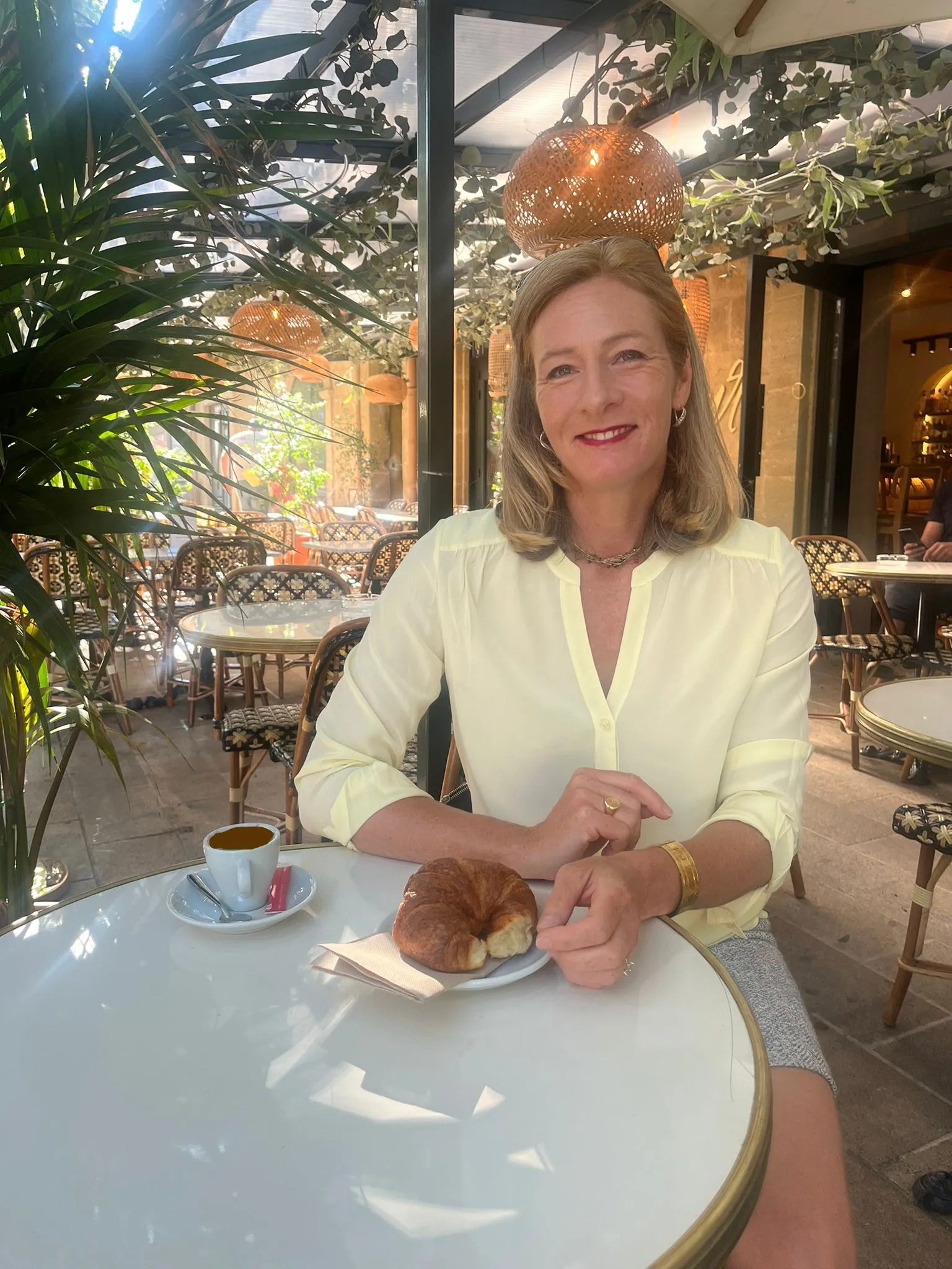 Heather at a café table in Aix-en-Provence